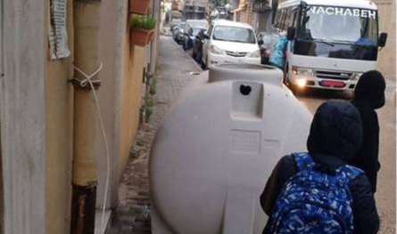 The fall of a water tank from one of the buildings in the port